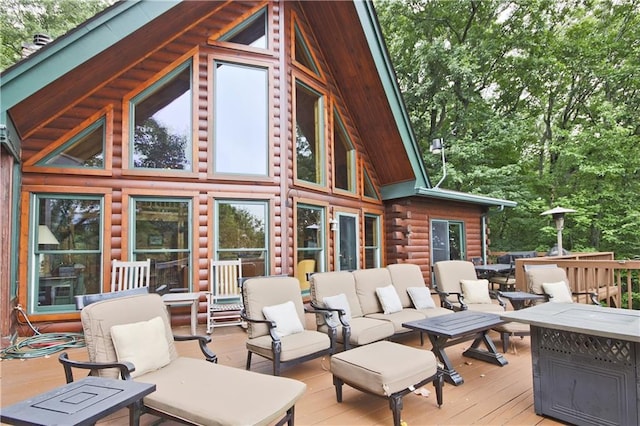 wooden deck featuring an outdoor hangout area