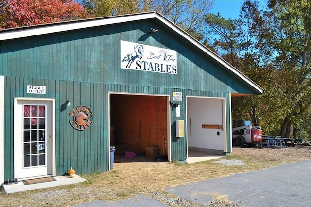 view of outdoor structure featuring a garage