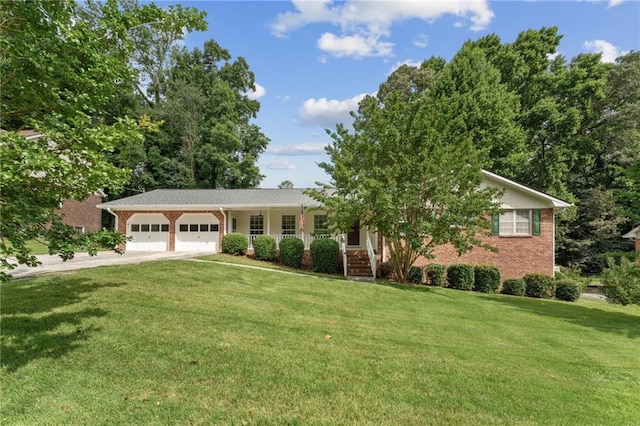 4135 Shoshone Valley Rd, Marietta, GA 30068 - view of front of property with an attached garage, a front yard, driveway, and brick siding
