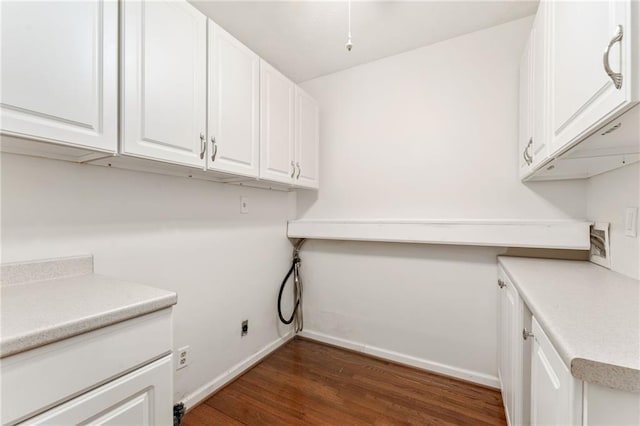 4135 Shoshone Valley Rd, Marietta, GA 30068 - laundry room featuring cabinet space, dark wood-style floors, and electric dryer hookup