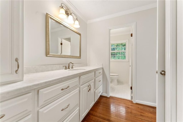 4135 Shoshone Valley Rd, Marietta, GA 30068 - bathroom with vanity, crown molding, and hardwood / wood-style floors