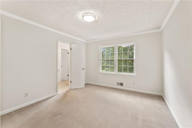 4135 Shoshone Valley Rd, Marietta, GA 30068 - spare room featuring a textured ceiling, crown molding, and light colored carpet