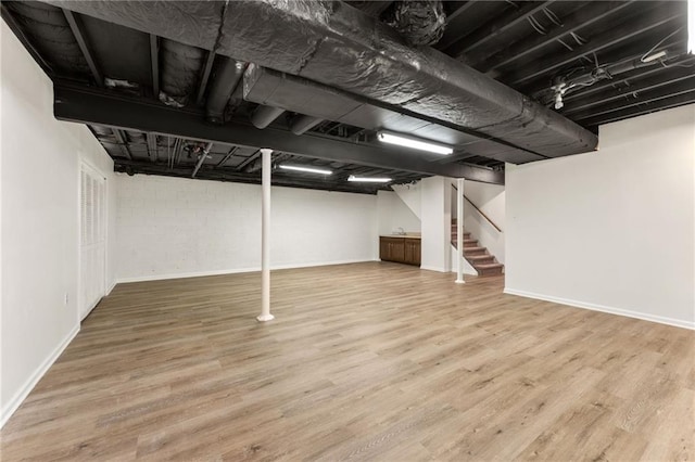 4135 Shoshone Valley Rd, Marietta, GA 30068 - finished below grade area with wood finished floors and stairs