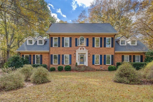 colonial house with a front lawn