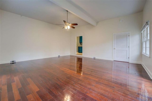 unfurnished room with beamed ceiling, dark hardwood / wood-style floors, and ceiling fan