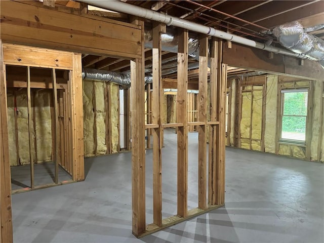 misc room with concrete flooring