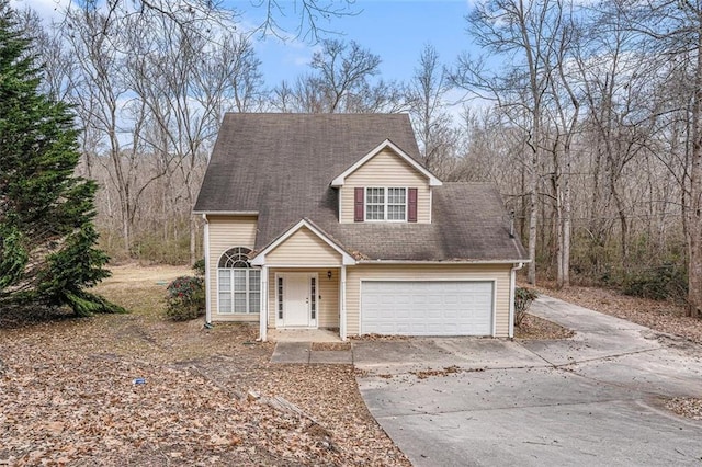 view of front of home with a garage