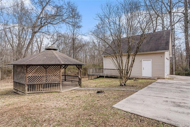 view of yard featuring a gazebo and a deck