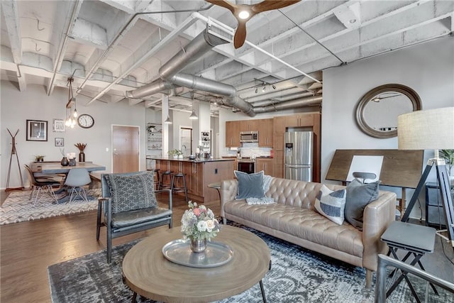 living room with dark hardwood / wood-style floors