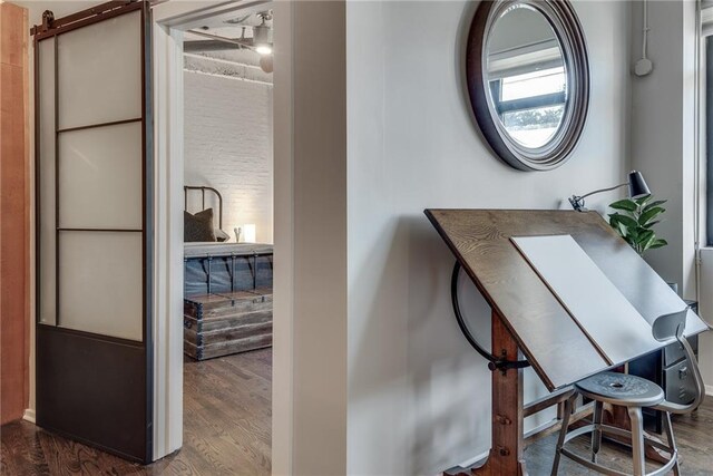 office space with dark wood-style flooring