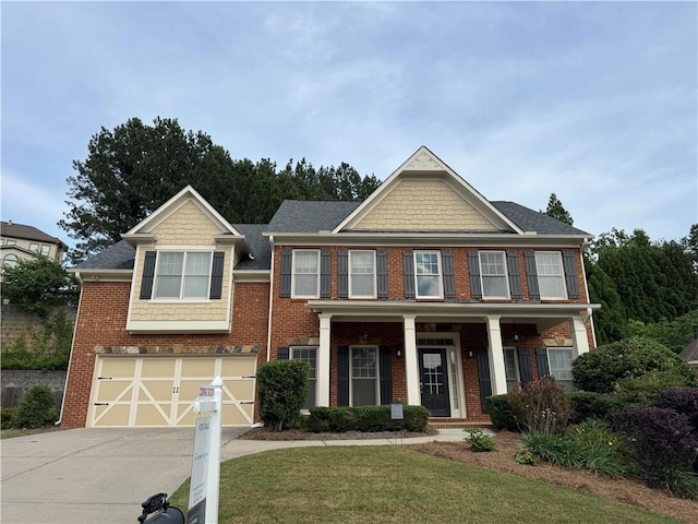 5865 Trailwood Ct, Suwanee, GA 30024 - view of front of property featuring concrete driveway, a garage, brick siding, and a front yard