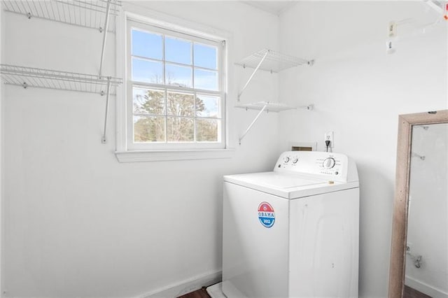 washroom with washer / clothes dryer