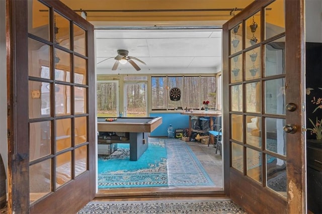 playroom featuring ceiling fan, pool table, and french doors