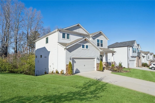 view of front facade featuring a garage and a front yard