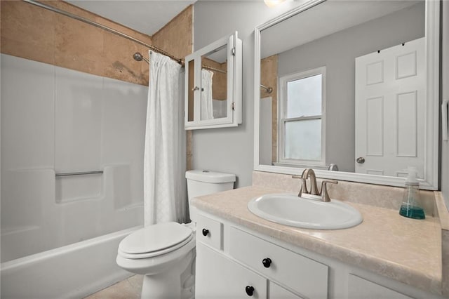 bathroom featuring vanity, toilet, and shower / bath combo with shower curtain
