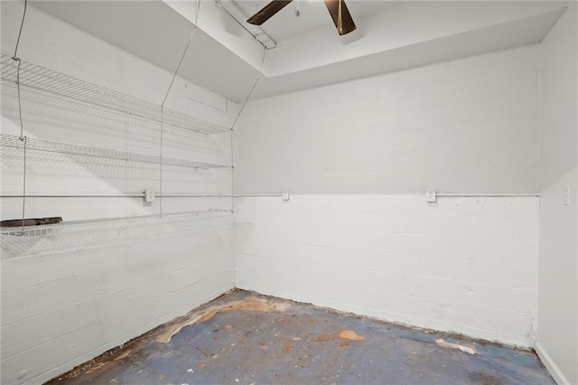 storage room with a ceiling fan
