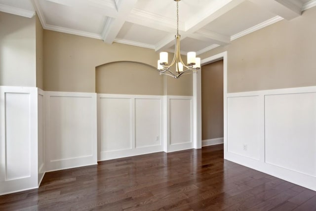 unfurnished dining area with a decorative wall, coffered ceiling, beamed ceiling, a chandelier, and wood finished floors