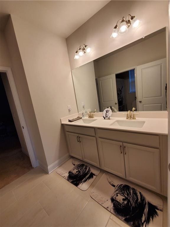 bathroom with vanity and tile patterned flooring