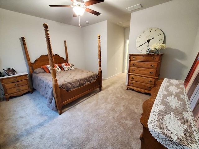 bedroom with light colored carpet and ceiling fan