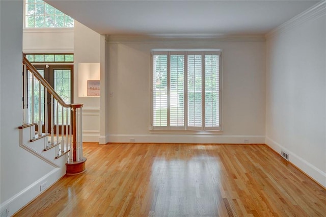5404 Chaversham Ln, Peachtree Corners, GA 30092 - unfurnished room with wood finished floors, stairway, baseboards, and ornamental molding