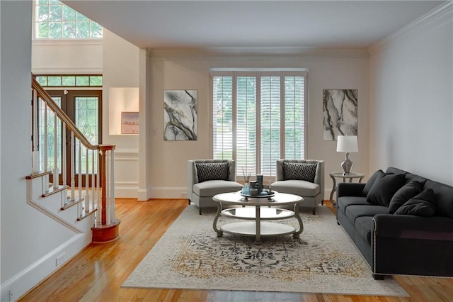 5404 Chaversham Ln, Peachtree Corners, GA 30092 - living area featuring stairway, wood finished floors, crown molding, and baseboards
