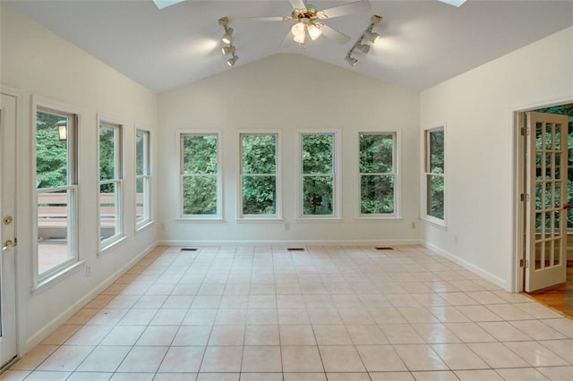 5404 Chaversham Ln, Peachtree Corners, GA 30092 - unfurnished sunroom with rail lighting, vaulted ceiling, healthy amount of natural light, and baseboards