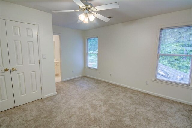 5404 Chaversham Ln, Peachtree Corners, GA 30092 - unfurnished bedroom featuring carpet floors, baseboards, and a ceiling fan