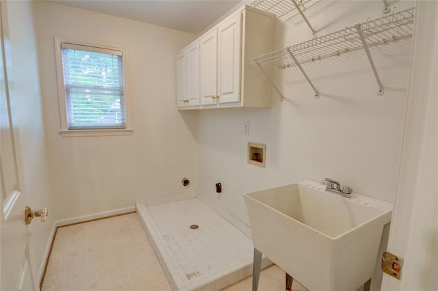 5404 Chaversham Ln, Peachtree Corners, GA 30092 - laundry room with washer hookup, cabinet space, and baseboards