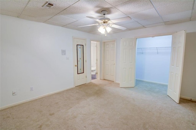 5404 Chaversham Ln, Peachtree Corners, GA 30092 - unfurnished bedroom featuring carpet floors, a paneled ceiling, baseboards, and ceiling fan