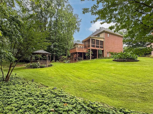 5404 Chaversham Ln, Peachtree Corners, GA 30092 - view of grassy yard with a sunroom, a gazebo, and a wooden deck
