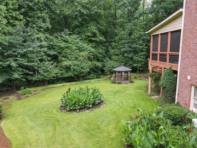 5404 Chaversham Ln, Peachtree Corners, GA 30092 - view of green lawn with a gazebo and a sunroom