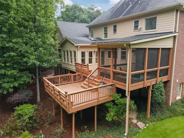 5404 Chaversham Ln, Peachtree Corners, GA 30092 - back of house featuring a sunroom, a deck, and roof with shingles