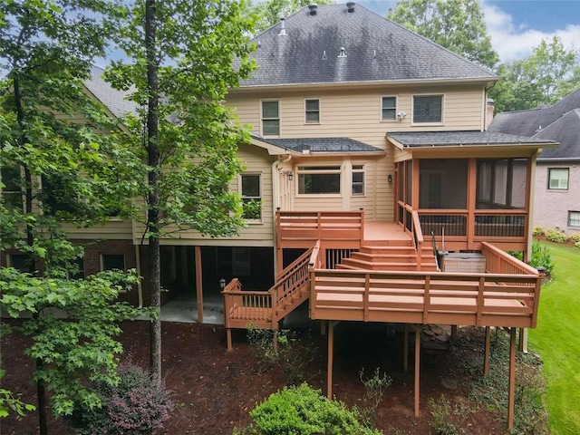 5404 Chaversham Ln, Peachtree Corners, GA 30092 - rear view of house featuring a sunroom, a shingled roof, and a wooden deck