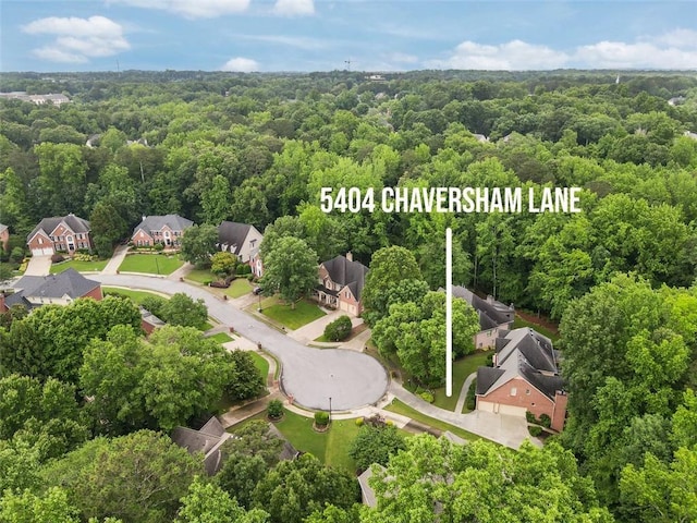 5404 Chaversham Ln, Peachtree Corners, GA 30092 - aerial view of residential area with a forest and property parcel outlined