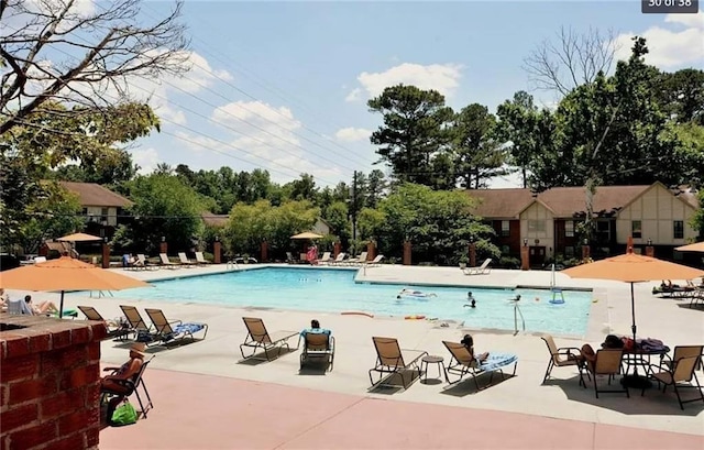 view of pool featuring a patio area