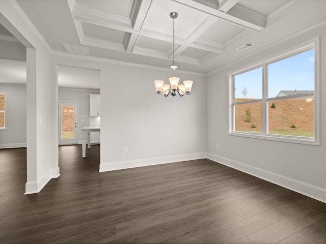 spare room with a healthy amount of sunlight, dark wood-style floors, visible vents, and ornamental molding