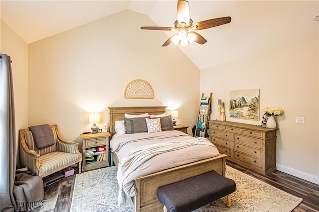 bedroom featuring vaulted ceiling, dark wood-type flooring, a ceiling fan, and baseboards