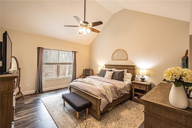 bedroom with dark wood-type flooring, high vaulted ceiling, baseboards, and a ceiling fan