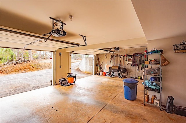 garage featuring a garage door opener