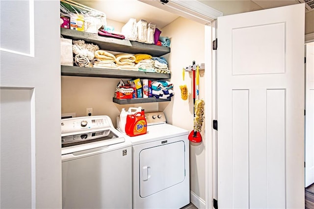 laundry area featuring laundry area and independent washer and dryer