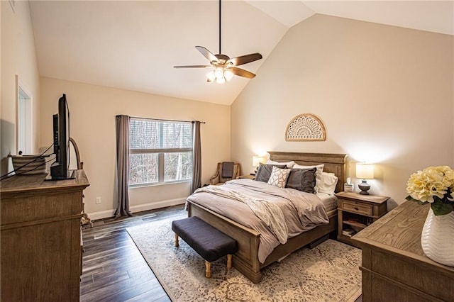 bedroom featuring ceiling fan, high vaulted ceiling, dark wood-style flooring, and baseboards