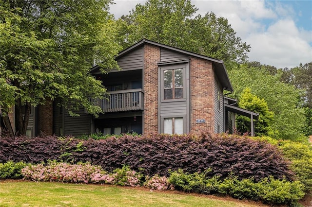 223 Tuxworth Cir, Decatur, GA 30033 - view of front of house featuring brick siding and a balcony
