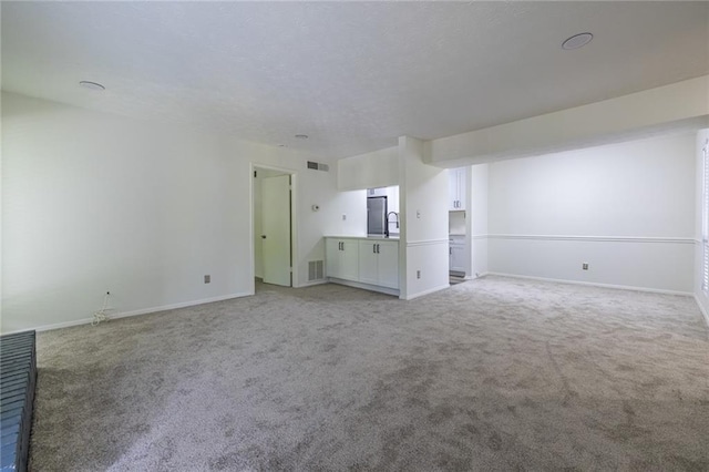 223 Tuxworth Cir, Decatur, GA 30033 - spare room with baseboards, light colored carpet, and visible vents