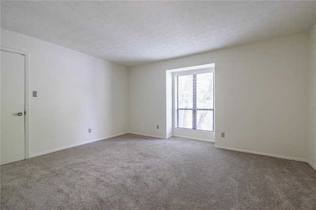 223 Tuxworth Cir, Decatur, GA 30033 - empty room with baseboards, a textured ceiling, and carpet