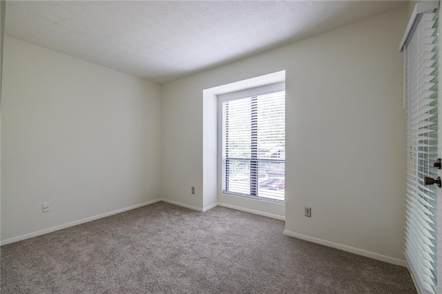 223 Tuxworth Cir, Decatur, GA 30033 - carpeted spare room featuring baseboards and a wealth of natural light
