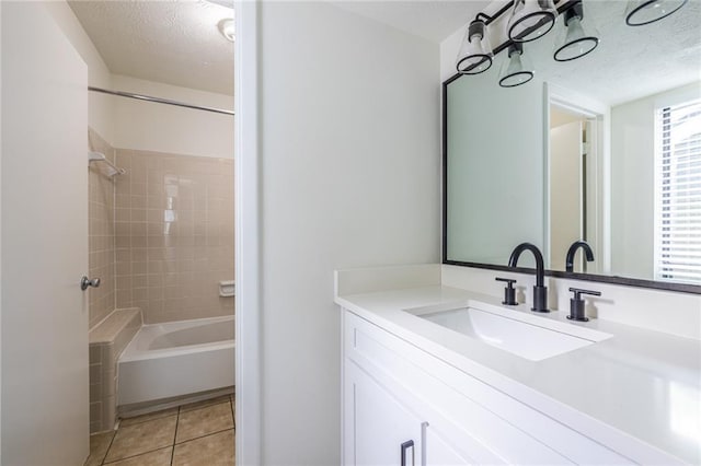 223 Tuxworth Cir, Decatur, GA 30033 - bathroom with vanity, a textured ceiling, tile patterned floors, and shower / washtub combination