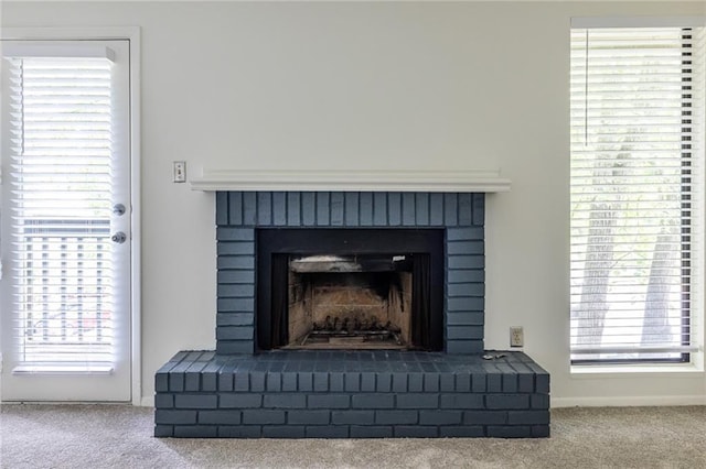 223 Tuxworth Cir, Decatur, GA 30033 - details featuring baseboards, carpet flooring, and a brick fireplace