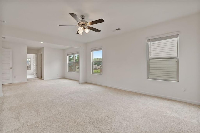 4117 Flat Rock Pt, Stonecrest, GA 30038 - spare room featuring ceiling fan, light carpet, and baseboards