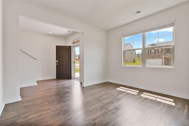 4117 Flat Rock Pt, Stonecrest, GA 30038 - entryway featuring healthy amount of natural light, dark wood-style flooring, and baseboards