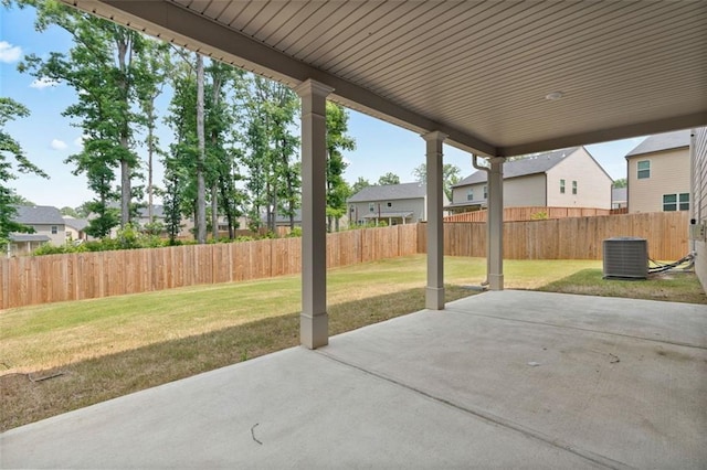 4117 Flat Rock Pt, Stonecrest, GA 30038 - view of patio with central AC and a residential view